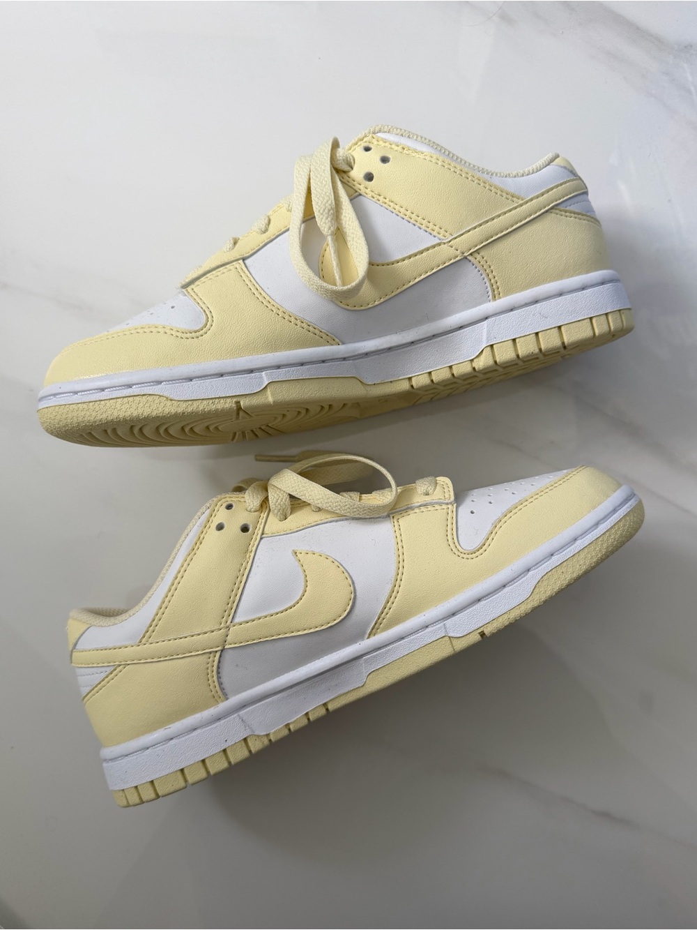 Nike Low-Top Sneakers in Pale Yellow & White